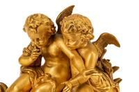 A French Gilt Bronze Figural Mantel Clock