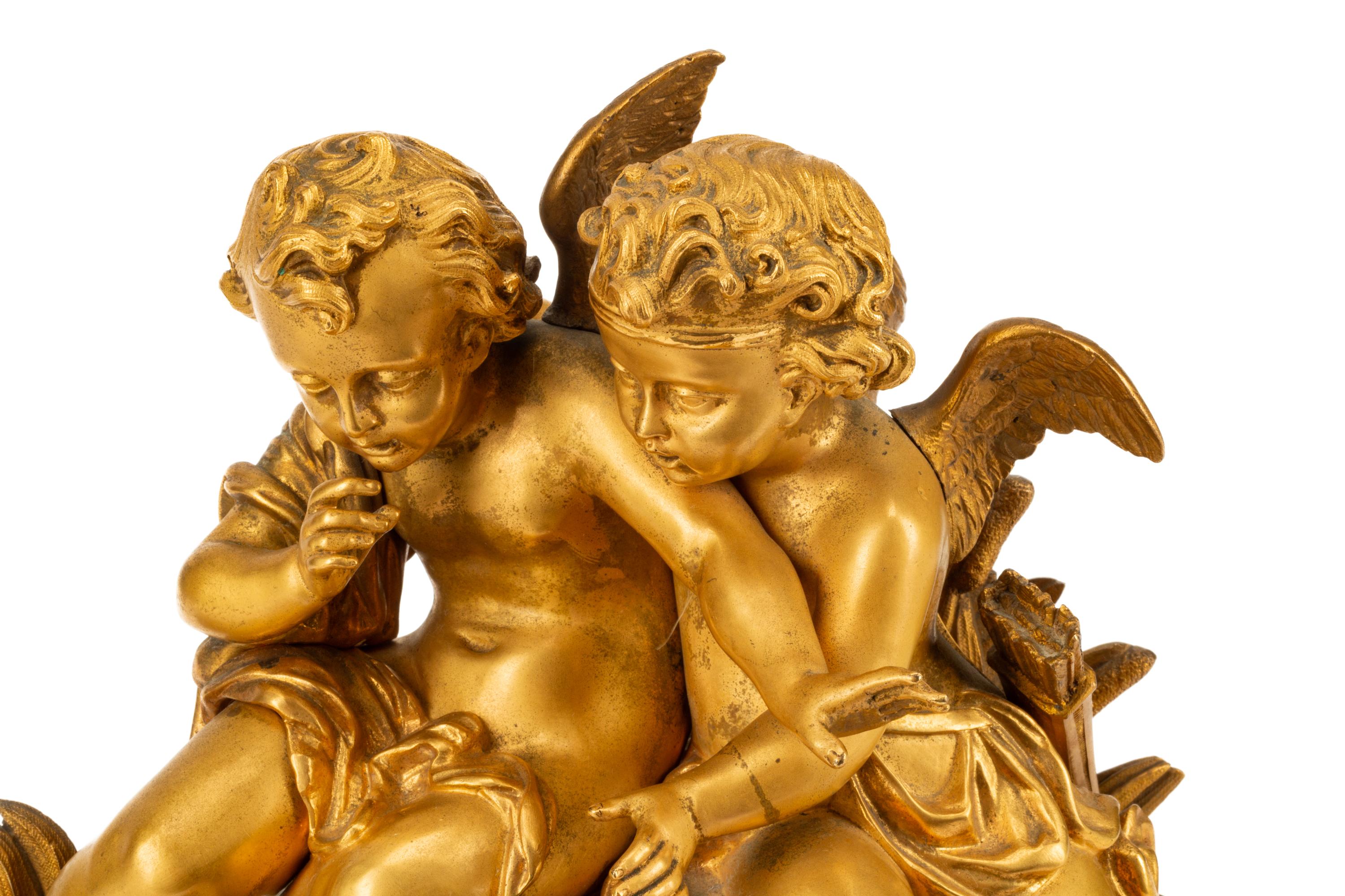 A French Gilt Bronze Figural Mantel Clock