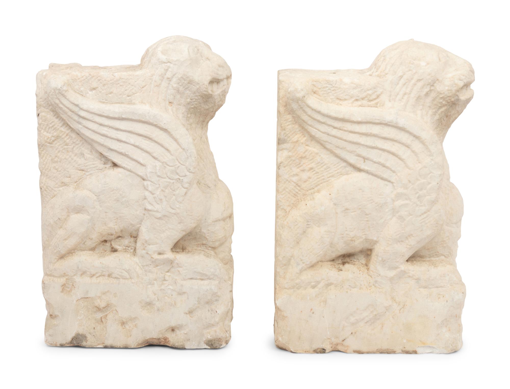 A Pair of Gothic Style Carved Marble Ornaments