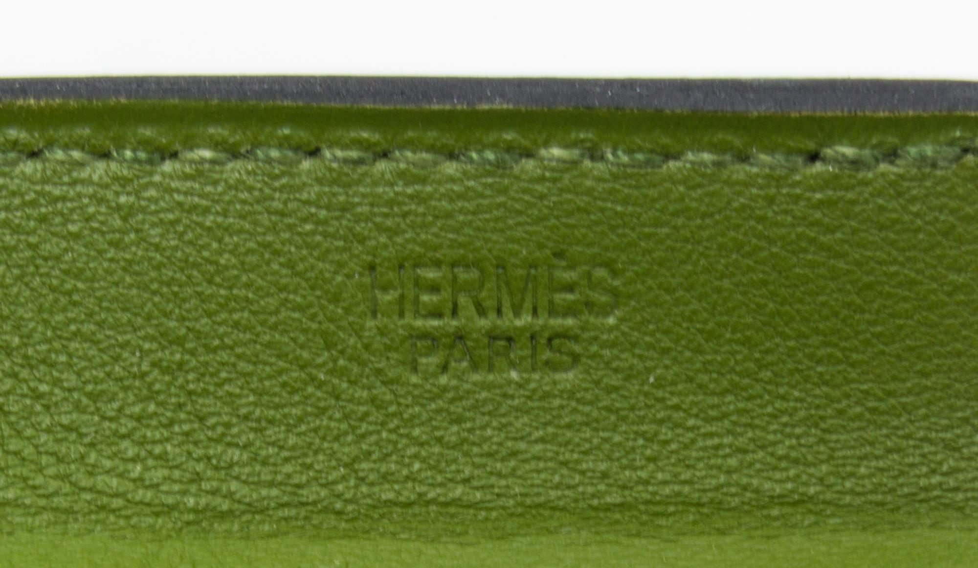 An Hermes Vert Anis Leather Passport Pouch, 7" x 8" x 1".