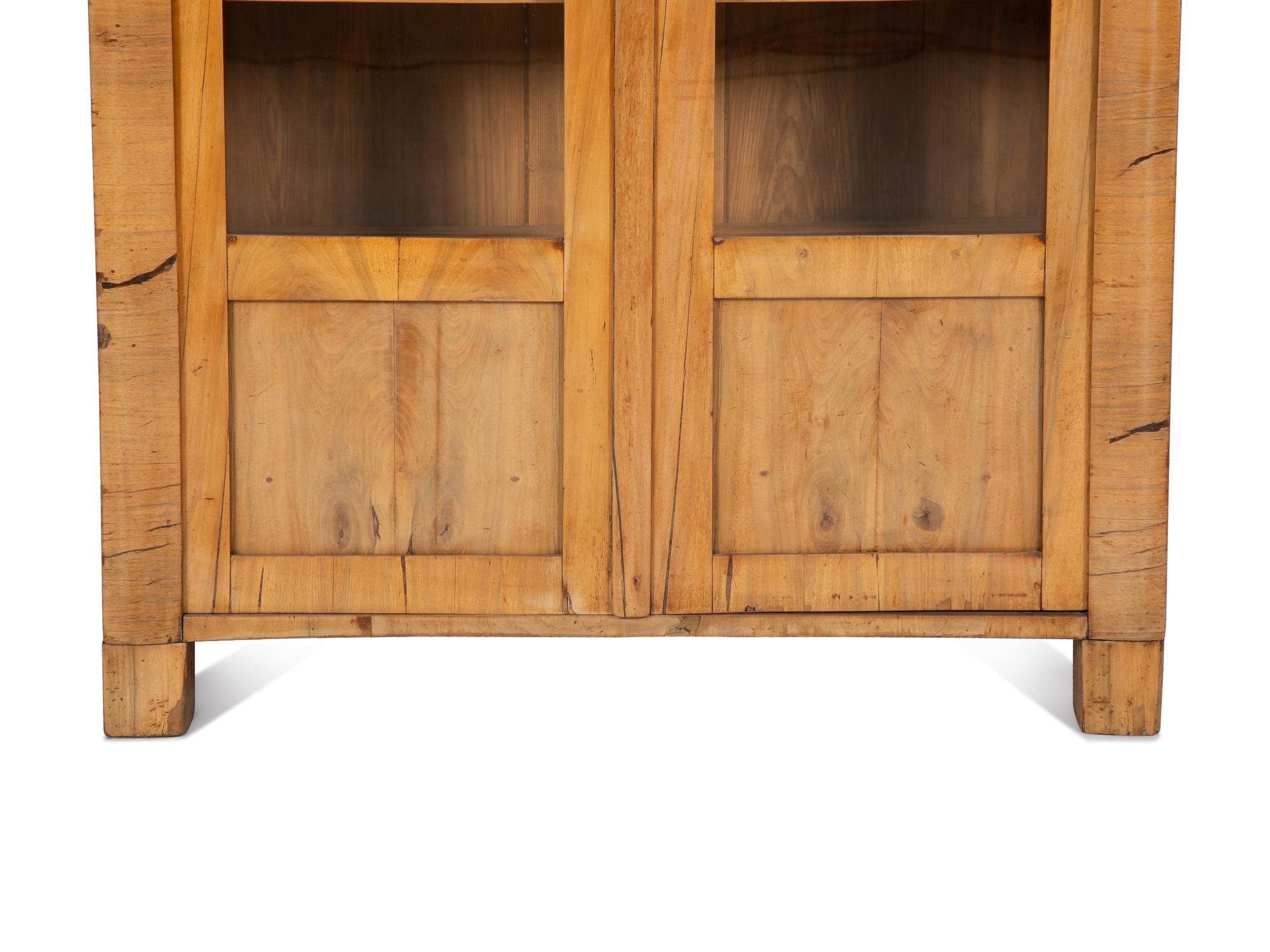 A Pair of Biedermeier Figured Birch Bookcases