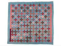 A Red Diamond on Blue Ground Pieced Cotton Quilt