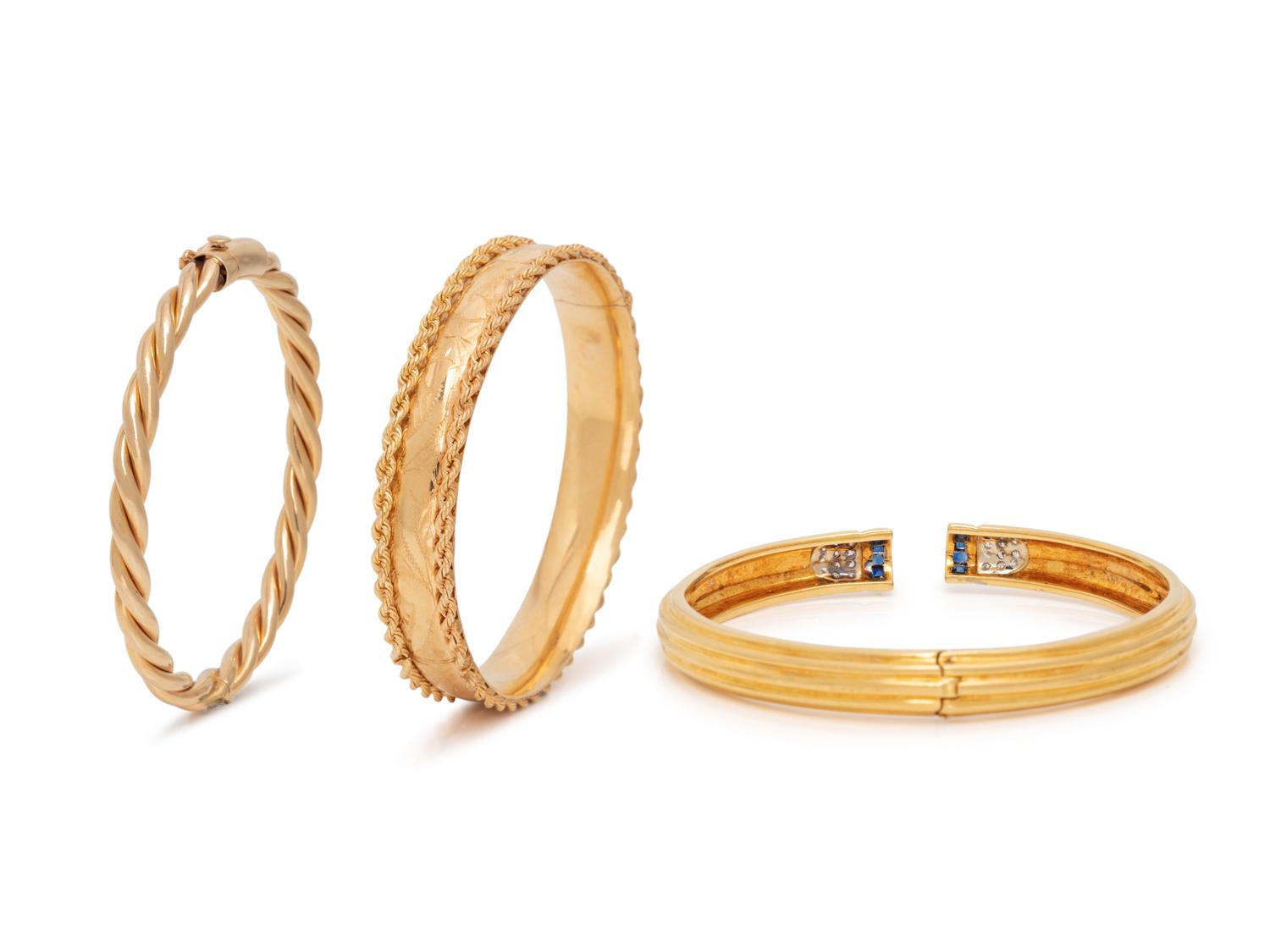 COLLECTION OF THREE YELLOW GOLD BANGLE BRACELETS