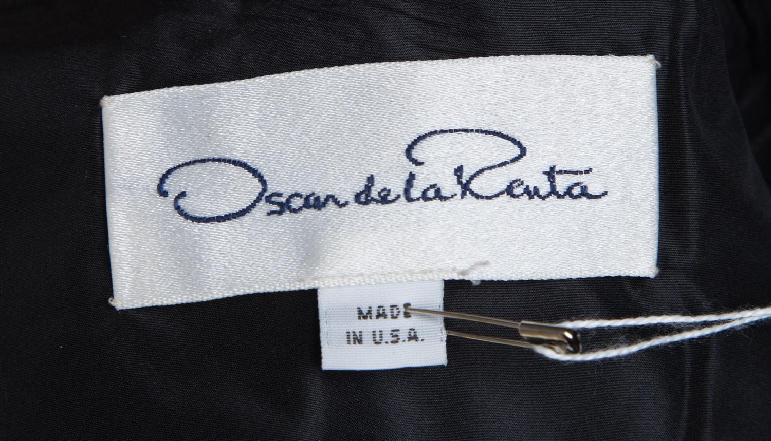 An Oscar de la Renta Black Silk Ruched Evening Jacket, Size 8.
