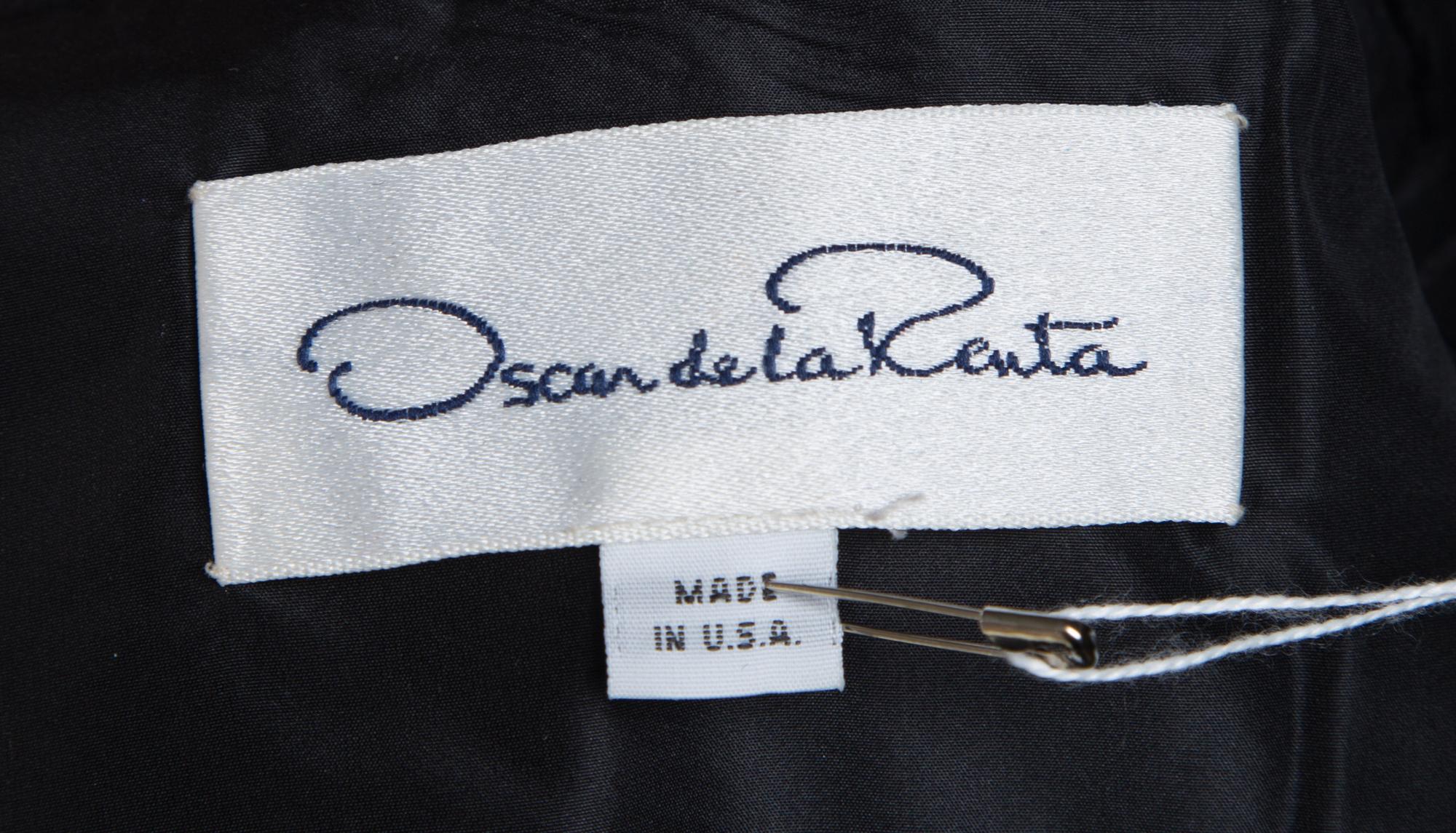 An Oscar de la Renta Black Silk Ruched Evening Jacket, Size 8.