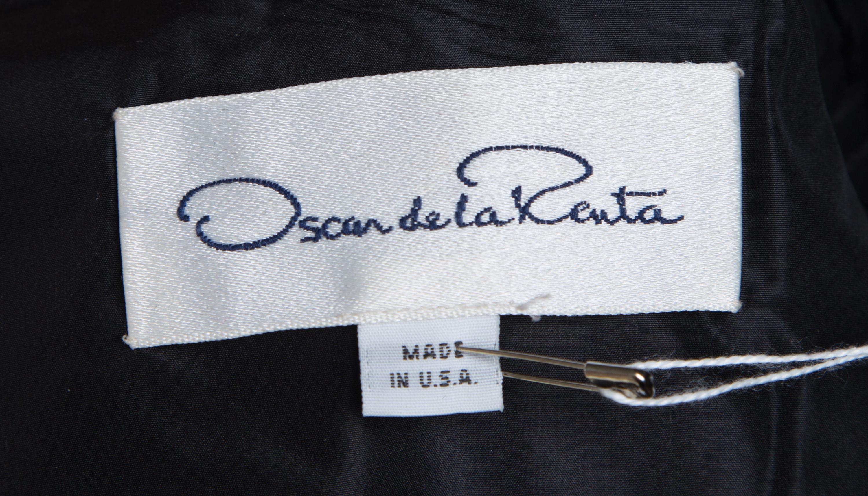 An Oscar de la Renta Black Silk Ruched Evening Jacket, Size 8.