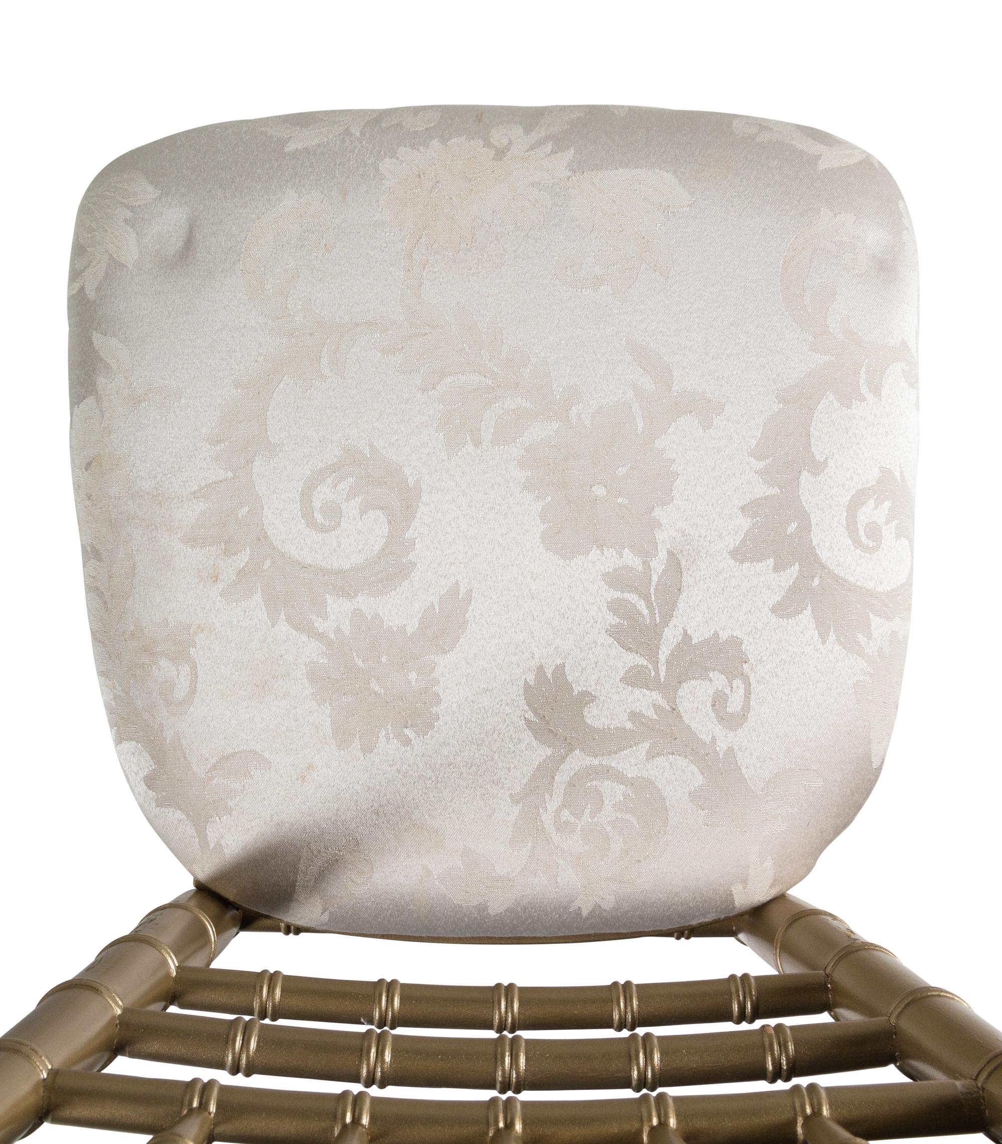 A Set of Twelve Gold-Painted Ballroom Chairs