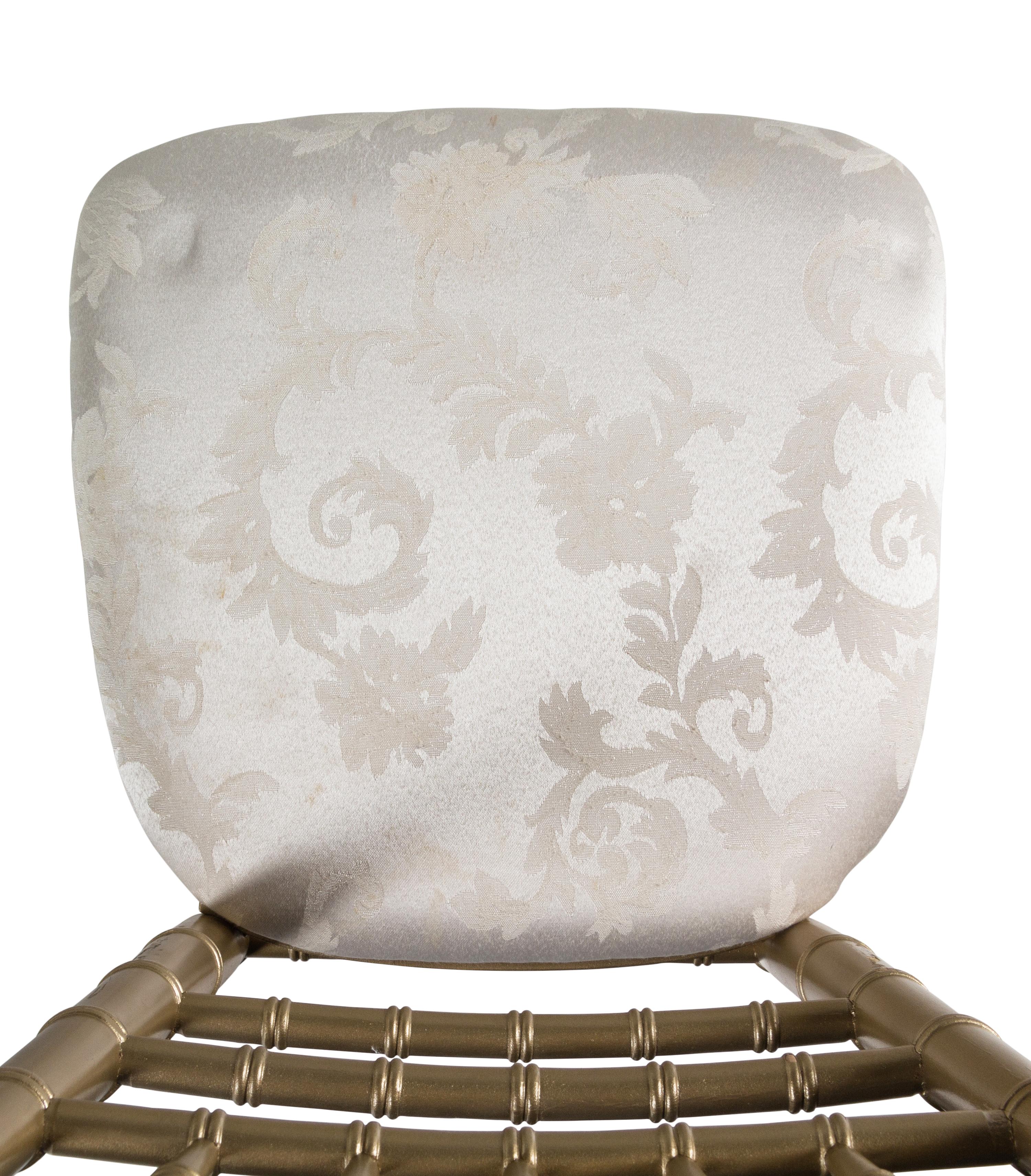 A Set of Twelve Gold-Painted Ballroom Chairs