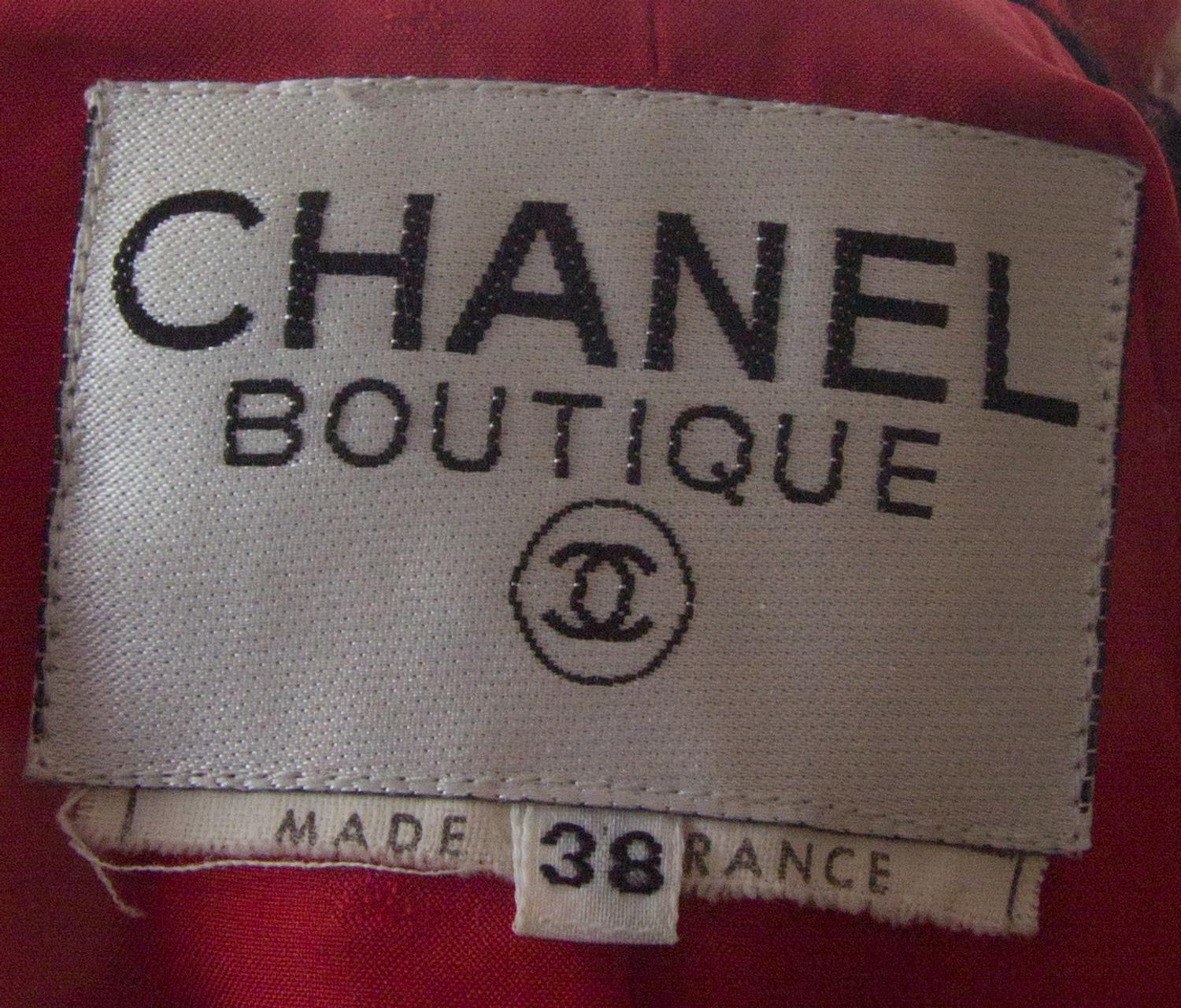 A Chanel Red, White and Black Tweed Jacket, Jacket size 38.