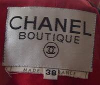 A Chanel Red, White and Black Tweed Jacket, Jacket size 38.