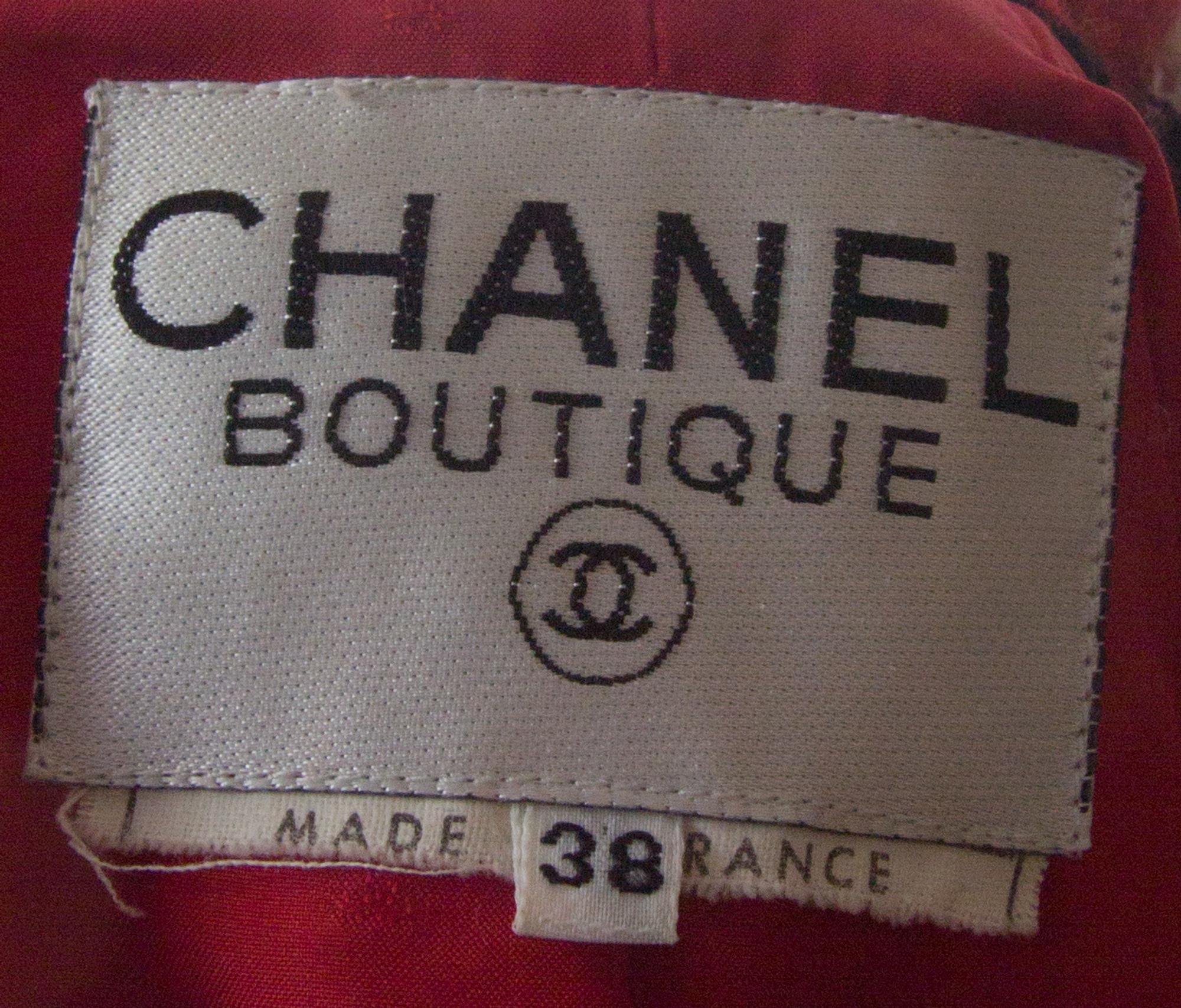 A Chanel Red, White and Black Tweed Jacket, Jacket size 38.
