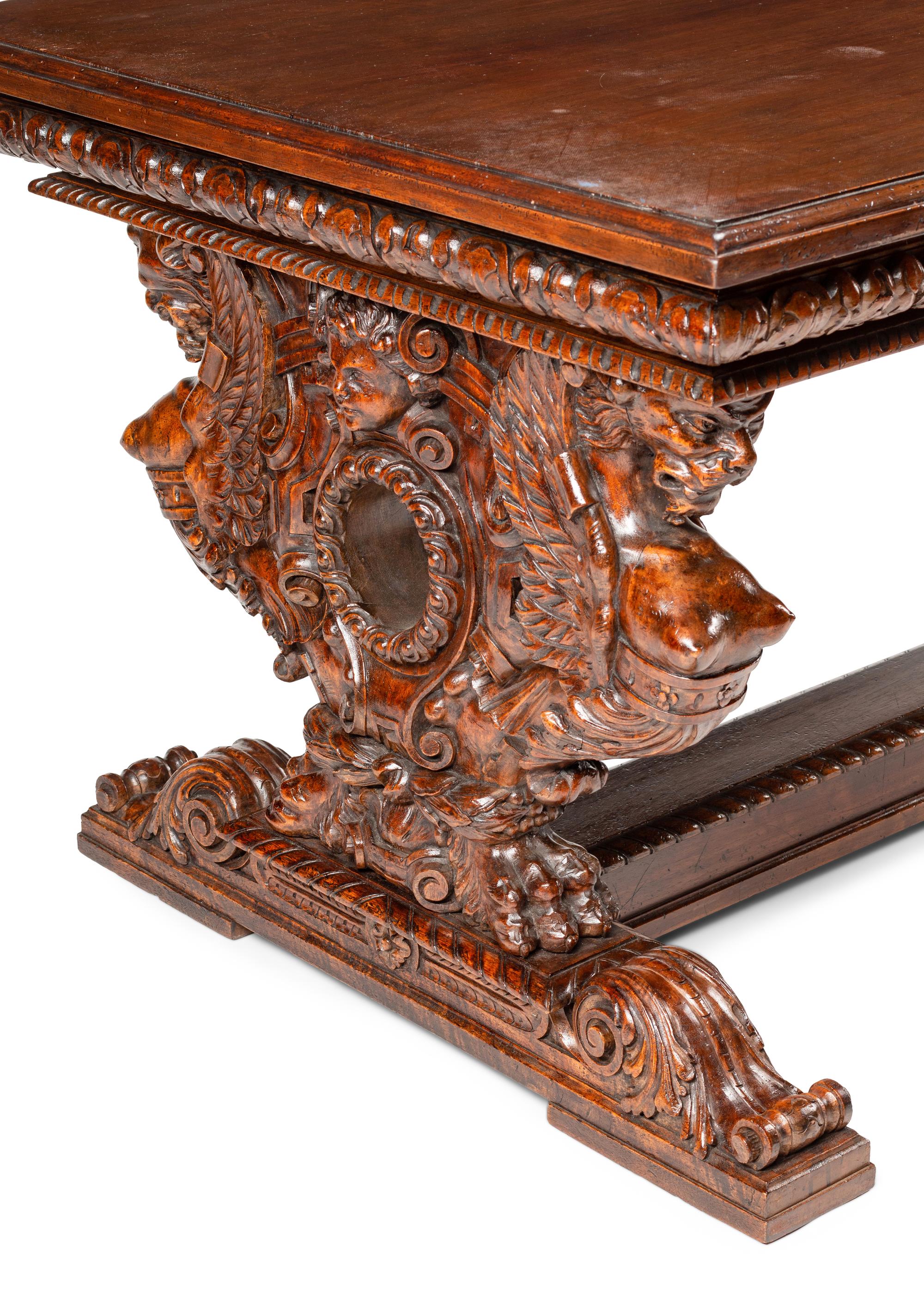 A Renaissance Revival Carved Walnut Library Table