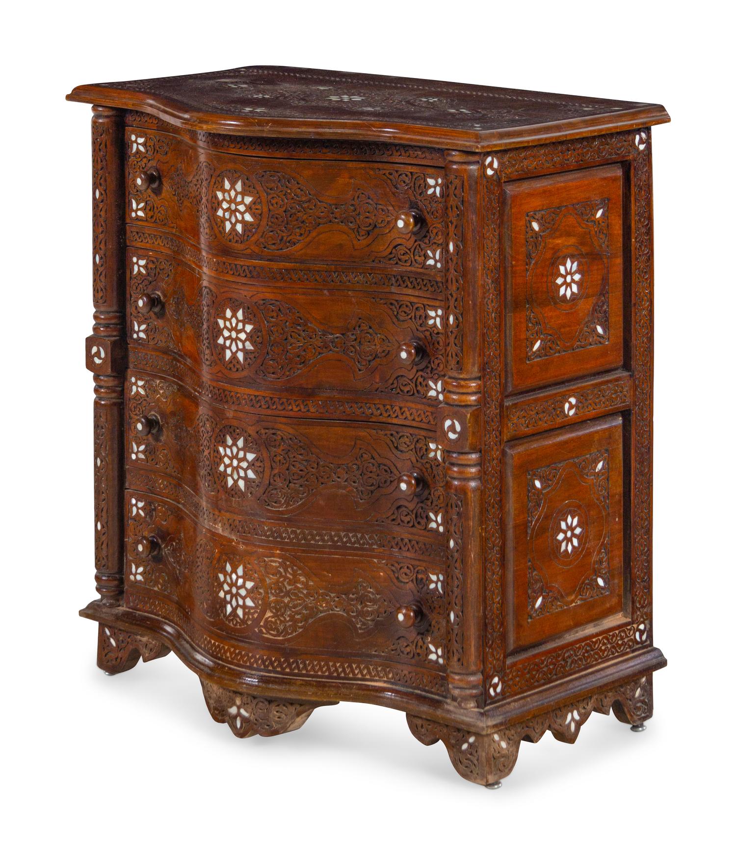 A Near Pair of Syrian Carved and Mother-of-Pearl Inlaid Walnut Serpentine Chest of Drawers