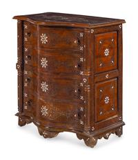 A Near Pair of Syrian Carved and Mother-of-Pearl Inlaid Walnut Serpentine Chest of Drawers