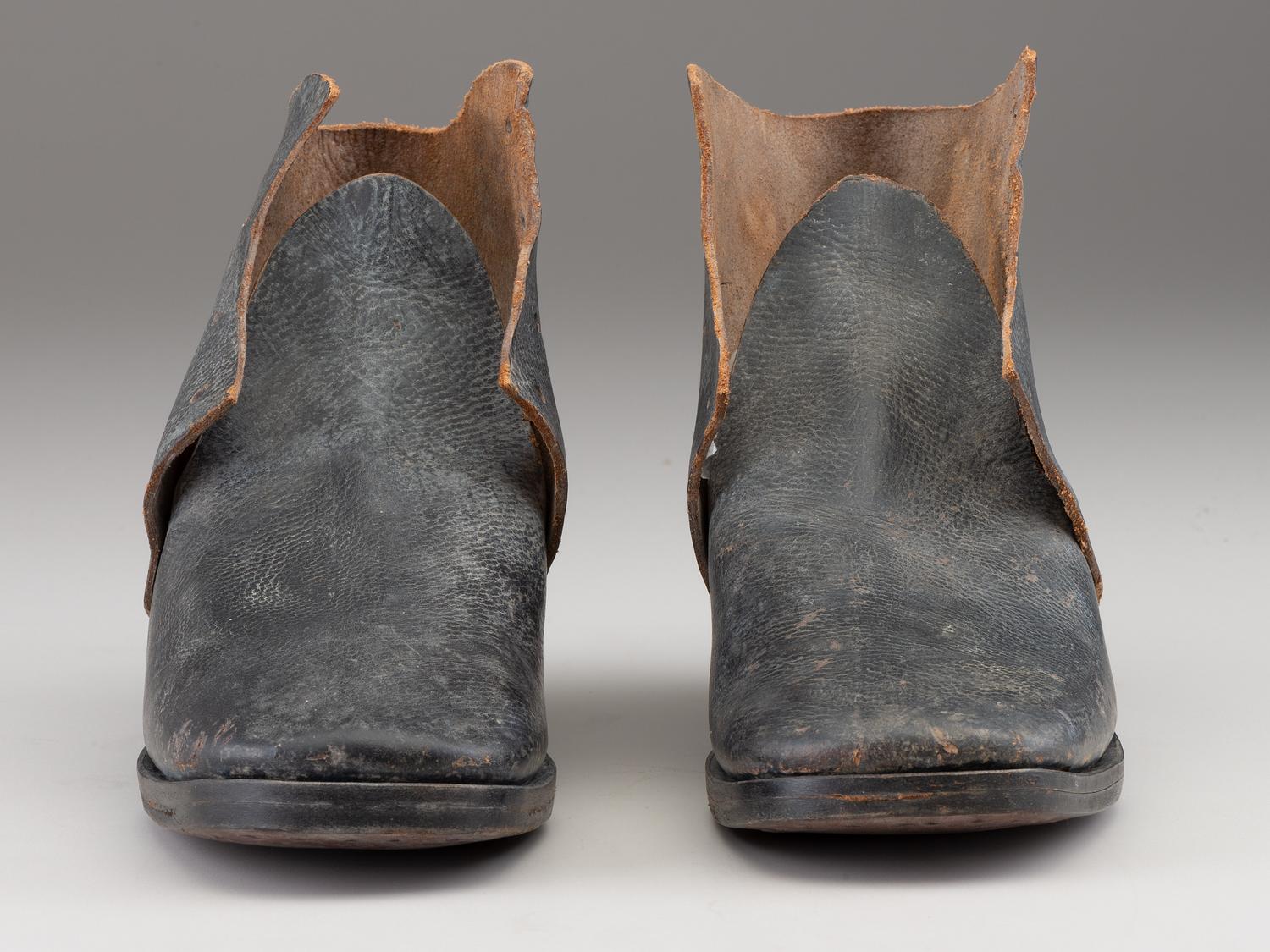 [CIVIL WAR]. A pair of military-issue brogans with a pair of Civil War-period socks.