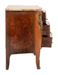 A Régence Style Bronze Mounted Marble Top Marquetry Commode