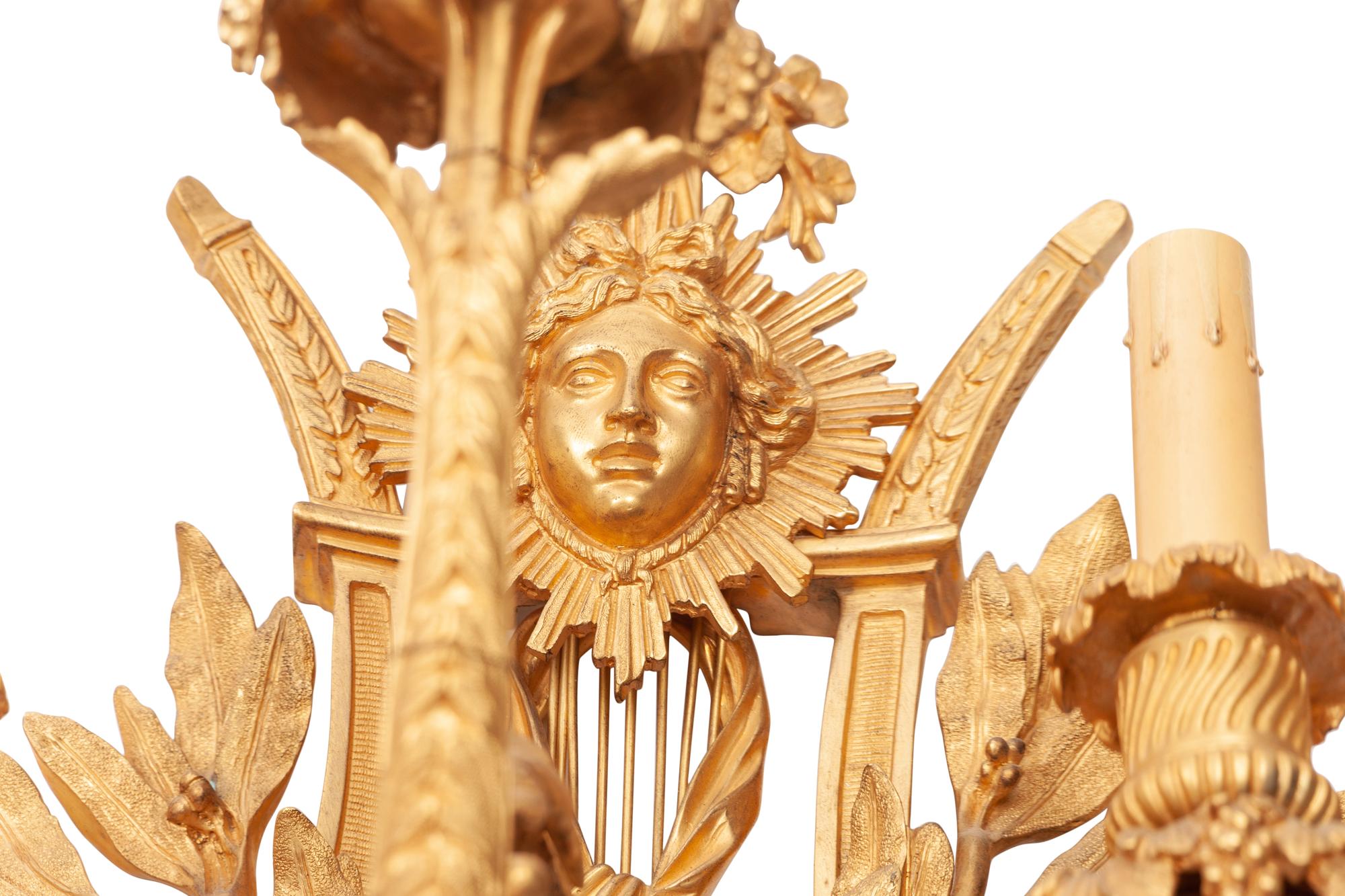 A Set of Four Louis XVI Style Gilt Bronze Five-Light Scones