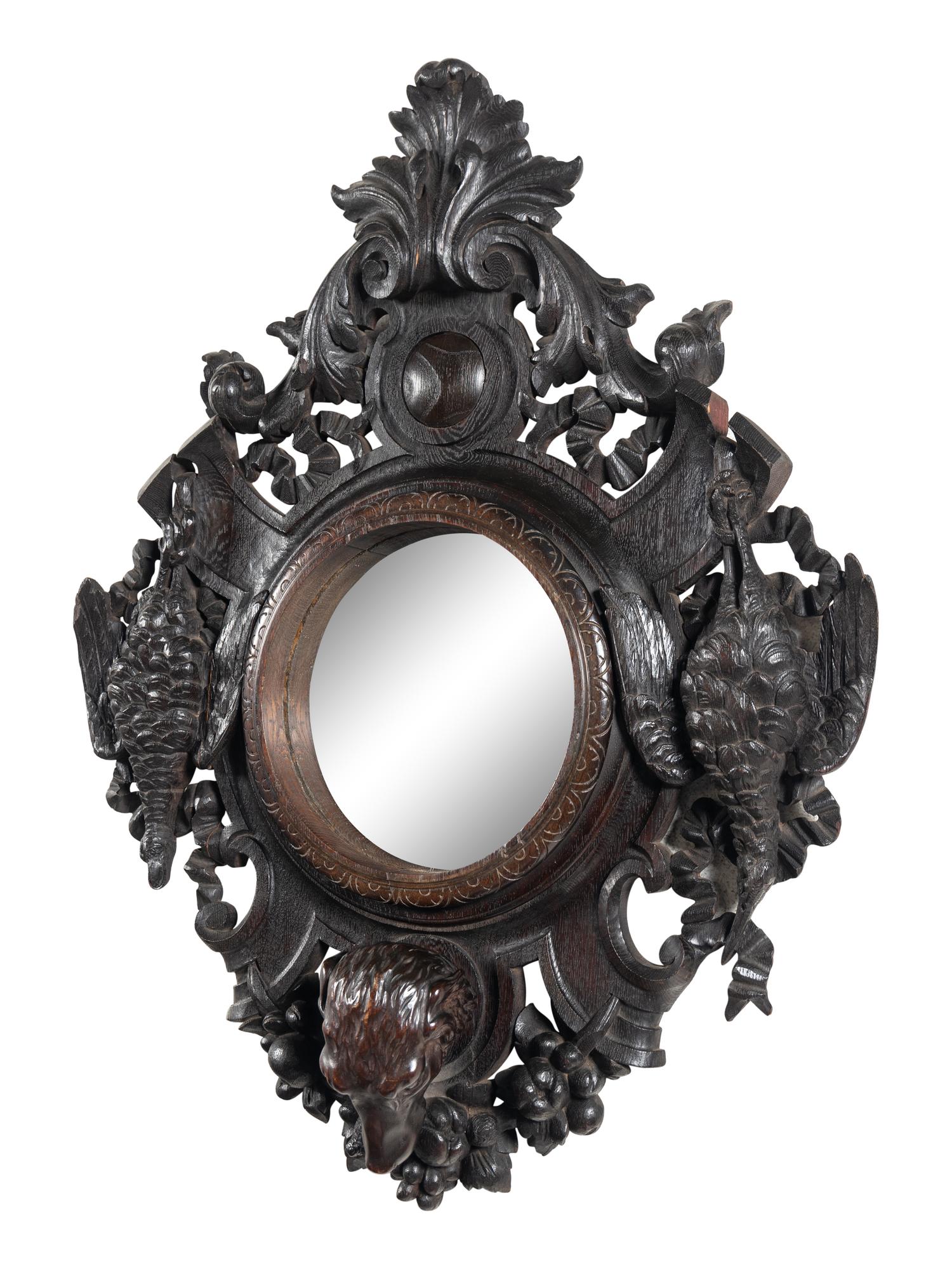 A Black Forest Carved Oak Game Trophy Mirror