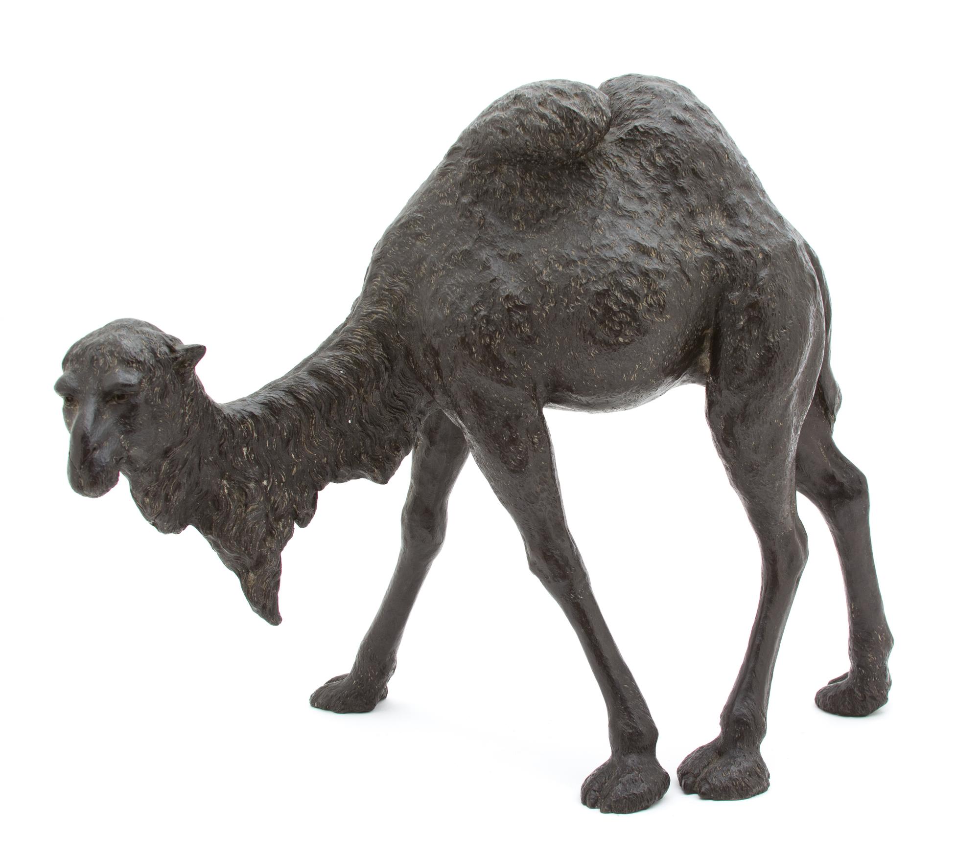 A Chinese Bronze Model of a Bactrian Camel Height 15 1/2 x length 20 1/2 inches. — 20TH CENTURY