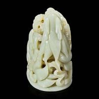 A Chinese pale celadon jade reticulated "Dragon" finial 青白玉镂空龙形炉端