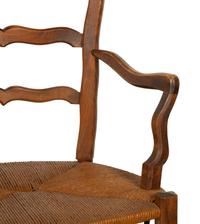 A Set of Four French Provincial Style Walnut Dining Chairs