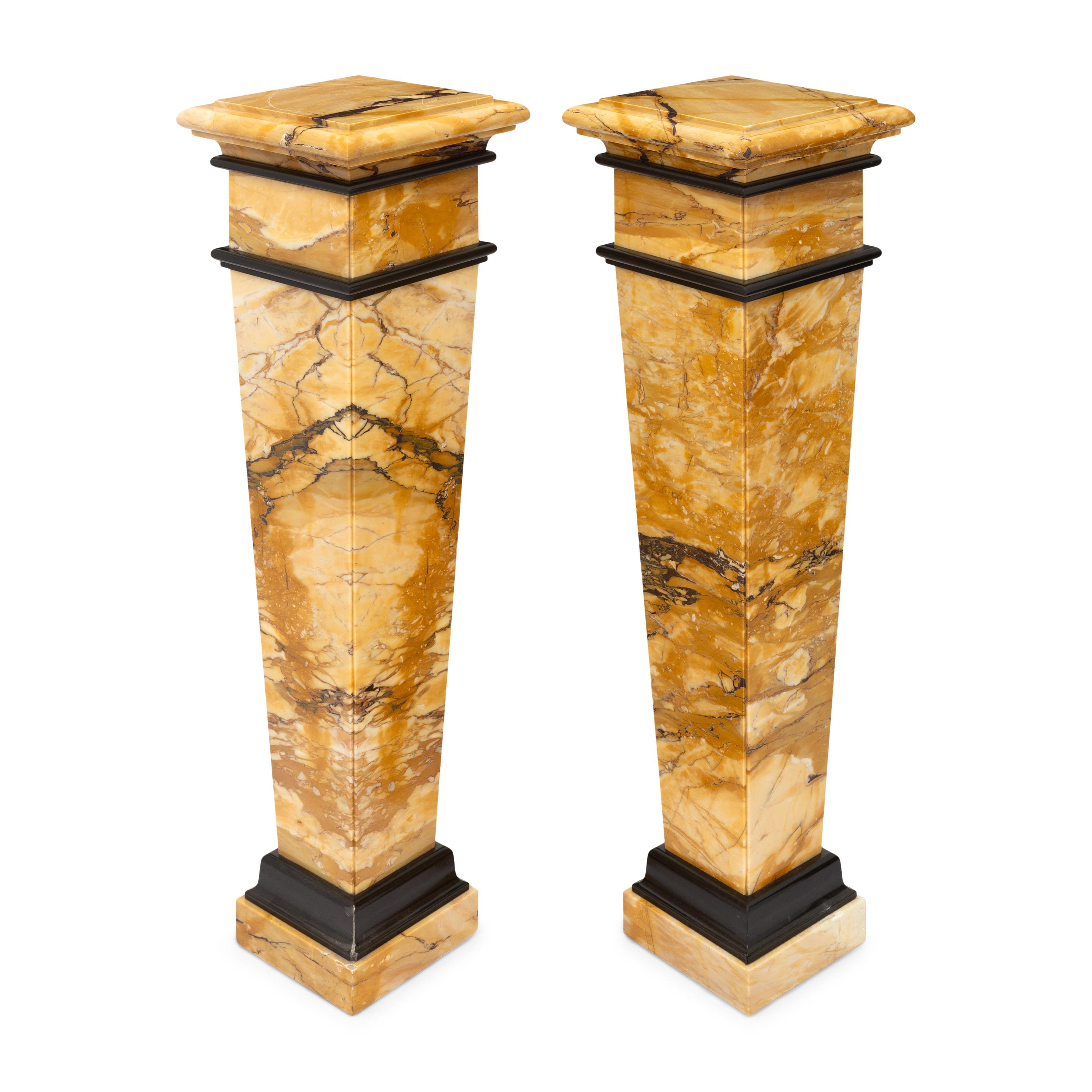 A Pair of Bi-Color Marble Pedestals