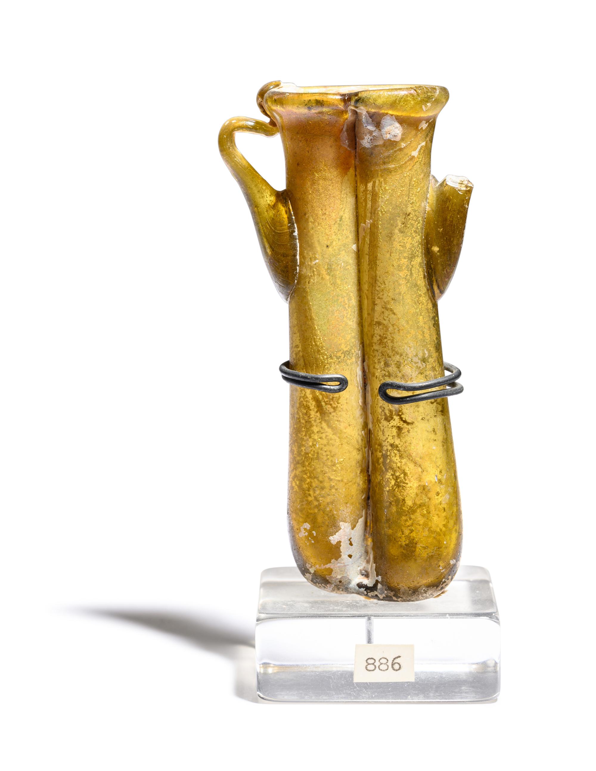 A Roman Yellow-Green Glass Double Unguentarium