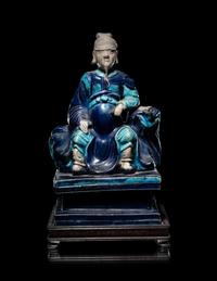 A Chinese Fahua Porcelain Figure of Seated Guardian, Guanyu