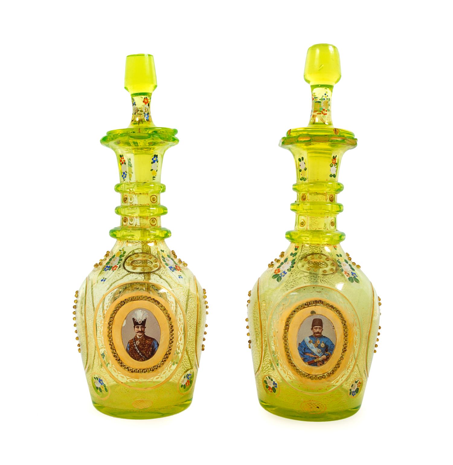 A Pair of Bohemian Enameled Glass Persian Market Decanters