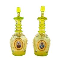 A Pair of Bohemian Enameled Glass Persian Market Decanters