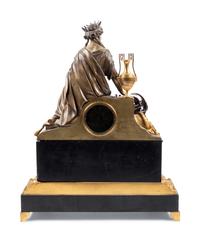 An Empire Style Gilt and Patinated Bronze Figural Mantel Clock