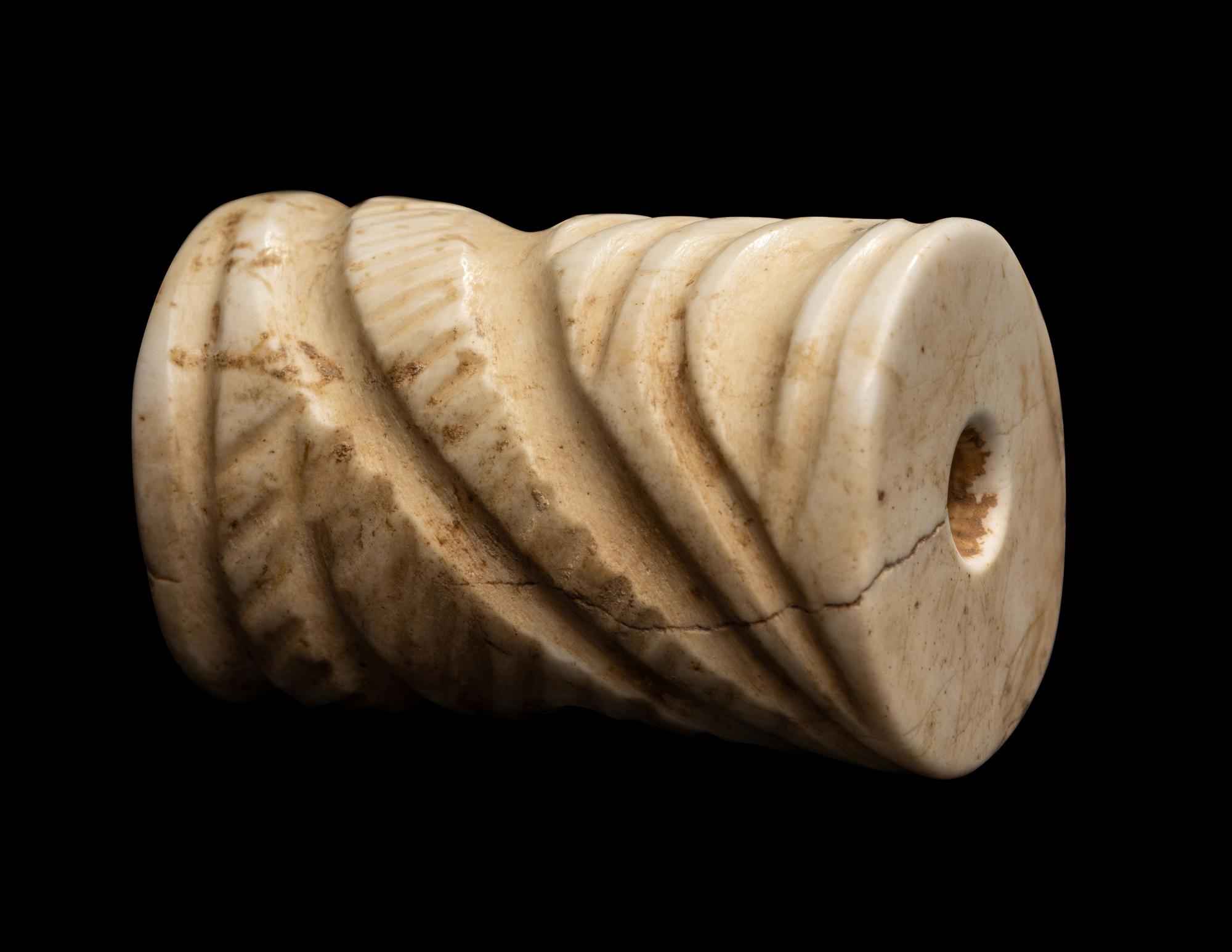 A Mesopotamian Limestone Cylinder Seal