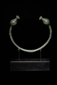 A Celtic Bronze Torc with Poppy-Head Terminals