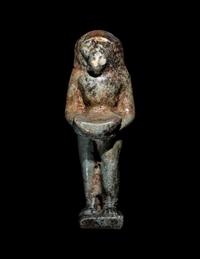 An Egyptian Faience Baboon Holding a Tray