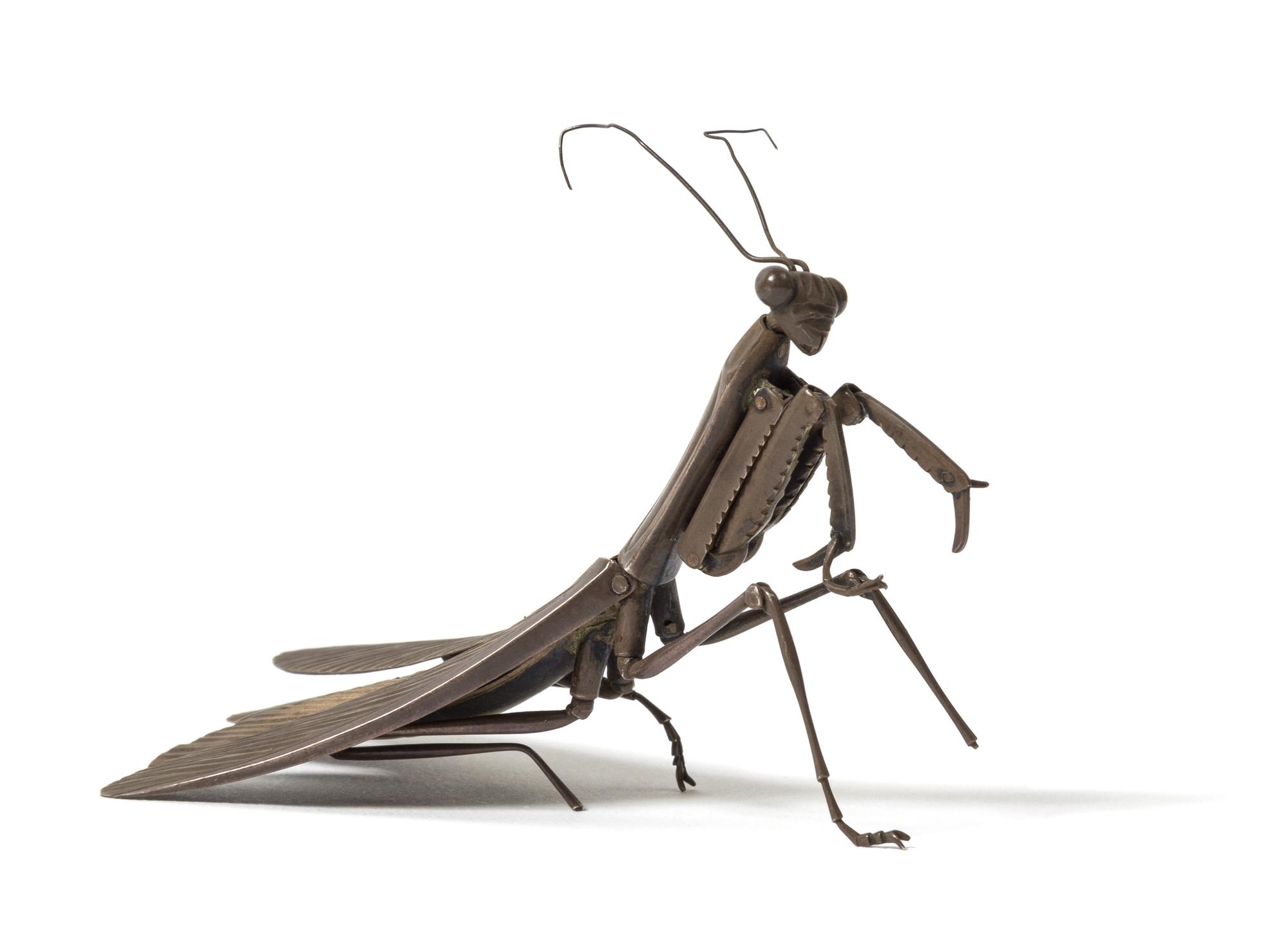 A Japanese Silver Articulated Model of a Praying Mantis MEIJI -TAISHO PERIOD, EARLY 20TH CENTURY Length 4 inches. — MEIJI-TAISHO PERIOD, EARLY 20TH CENTURY