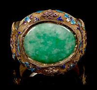 An Apple Green and Pale Celadon Jadeite Inset and Enamel Inlaid Silver-Gilt Filigree Bracelet