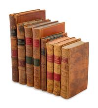 [LEATHER BINDINGS]. A group of 11 works in 31 volumes in 19th and 20th-century tan leather bindings, including: