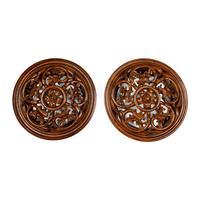 A Pair of Carved Oak Roundels