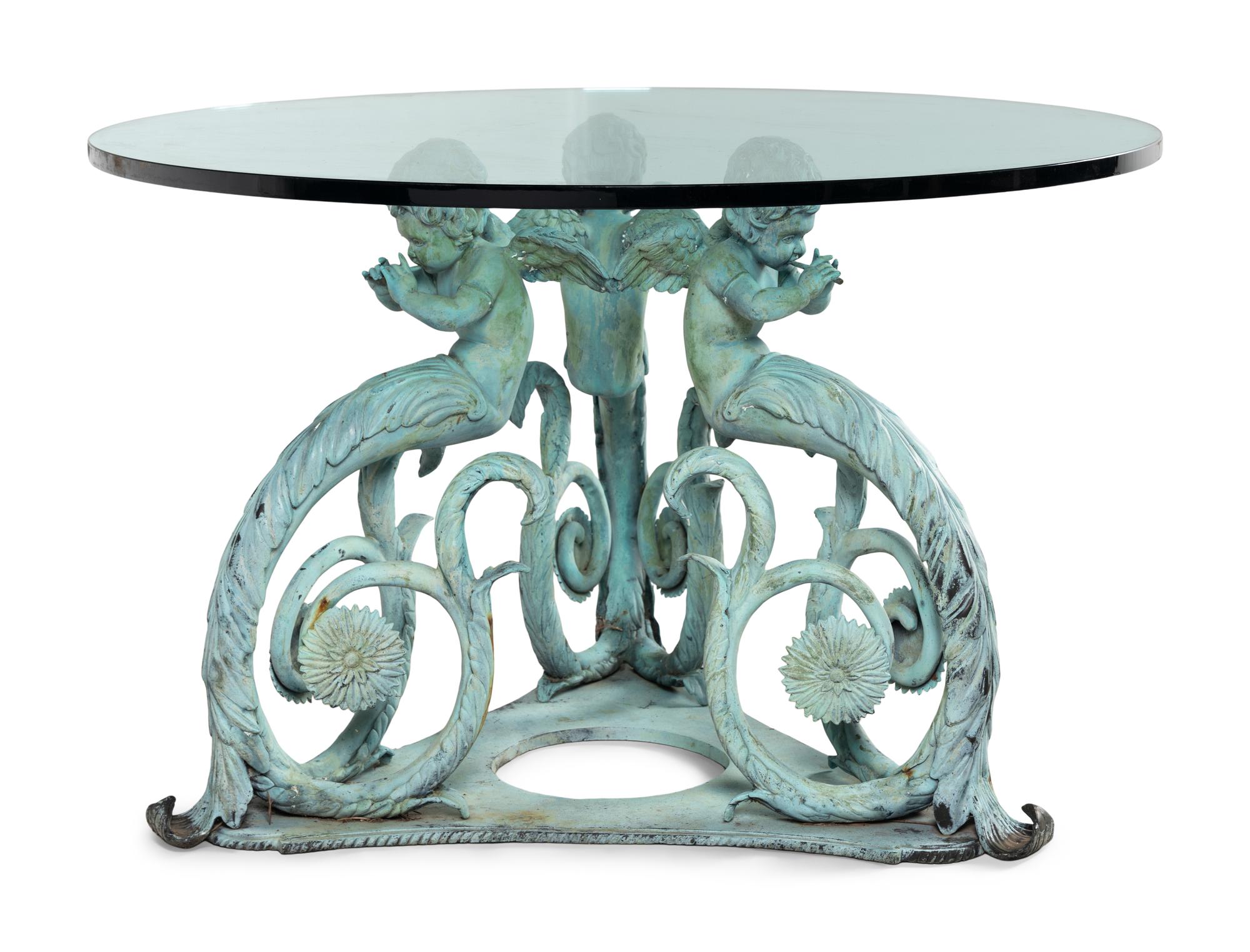 A Patinated Bronze and Glass Garden Table