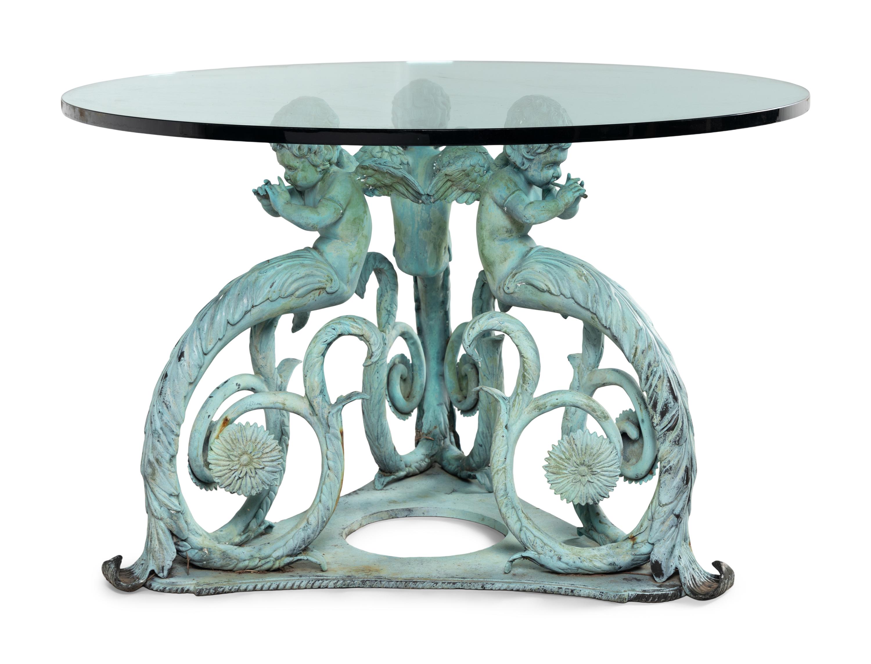 A Patinated Bronze and Glass Garden Table