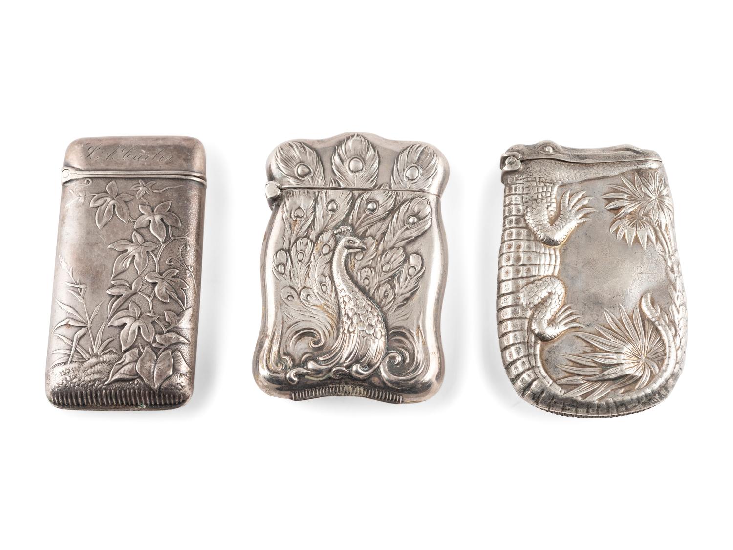 Three Silver Match Safes with Alligator, Peacock and Stag Motifs