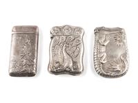 Three Silver Match Safes with Alligator, Peacock and Stag Motifs