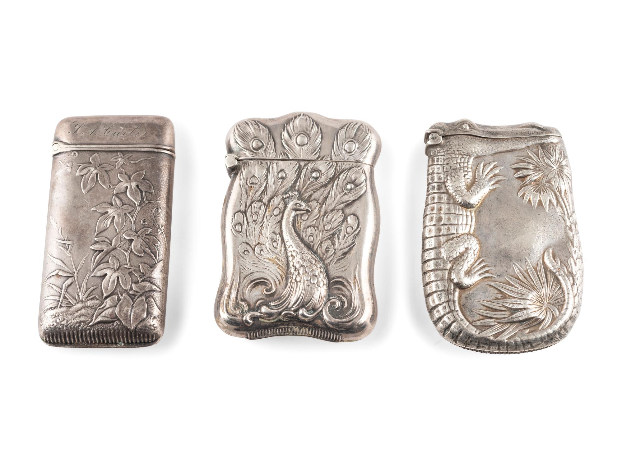 Three Silver Match Safes with Alligator, Peacock and Stag Motifs
