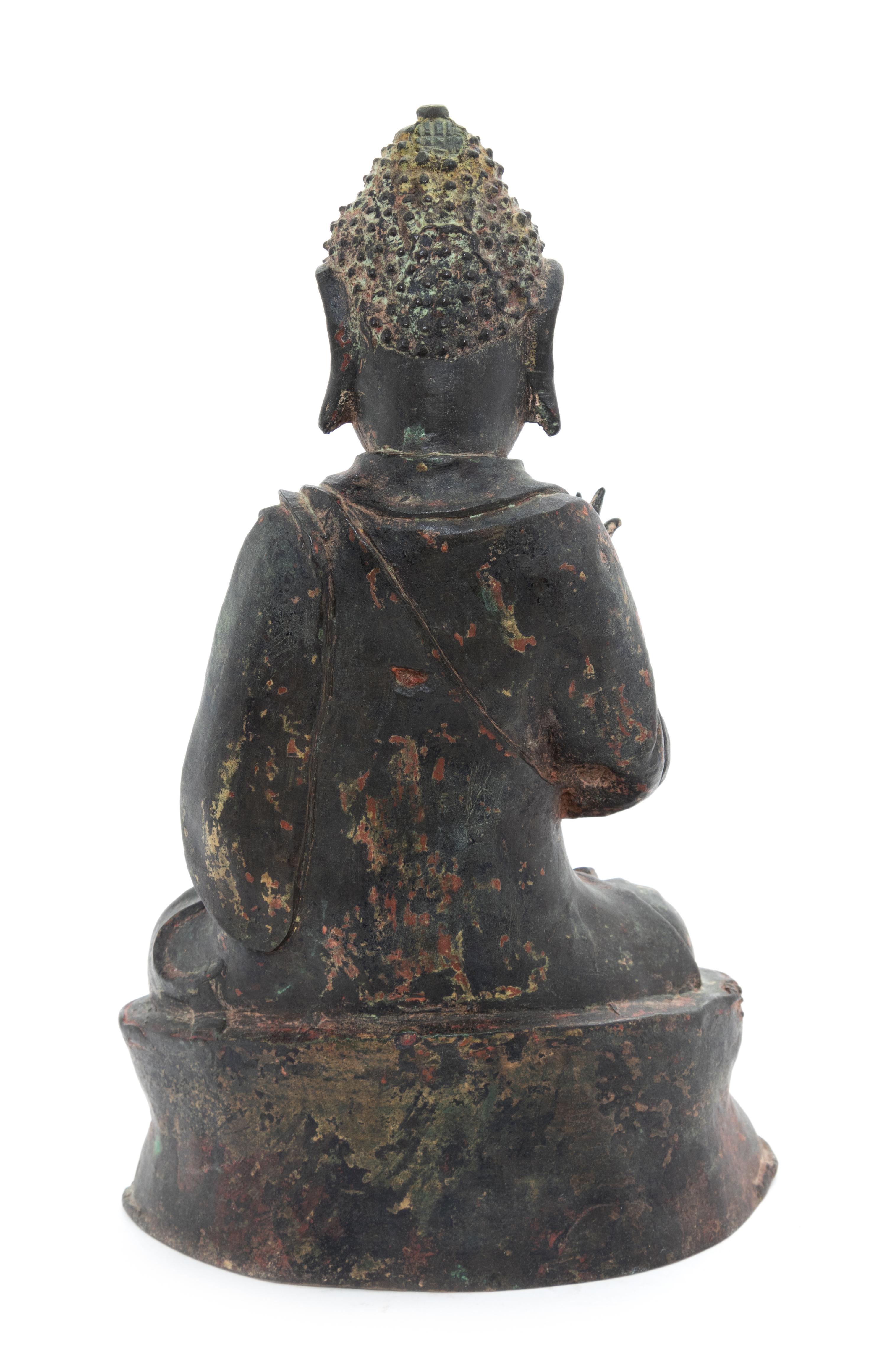 A Bronze Figure of Shakyamuni Buddha Height 10 1/4 inches. — LIKELY MING DYNASTY (1368-1644)