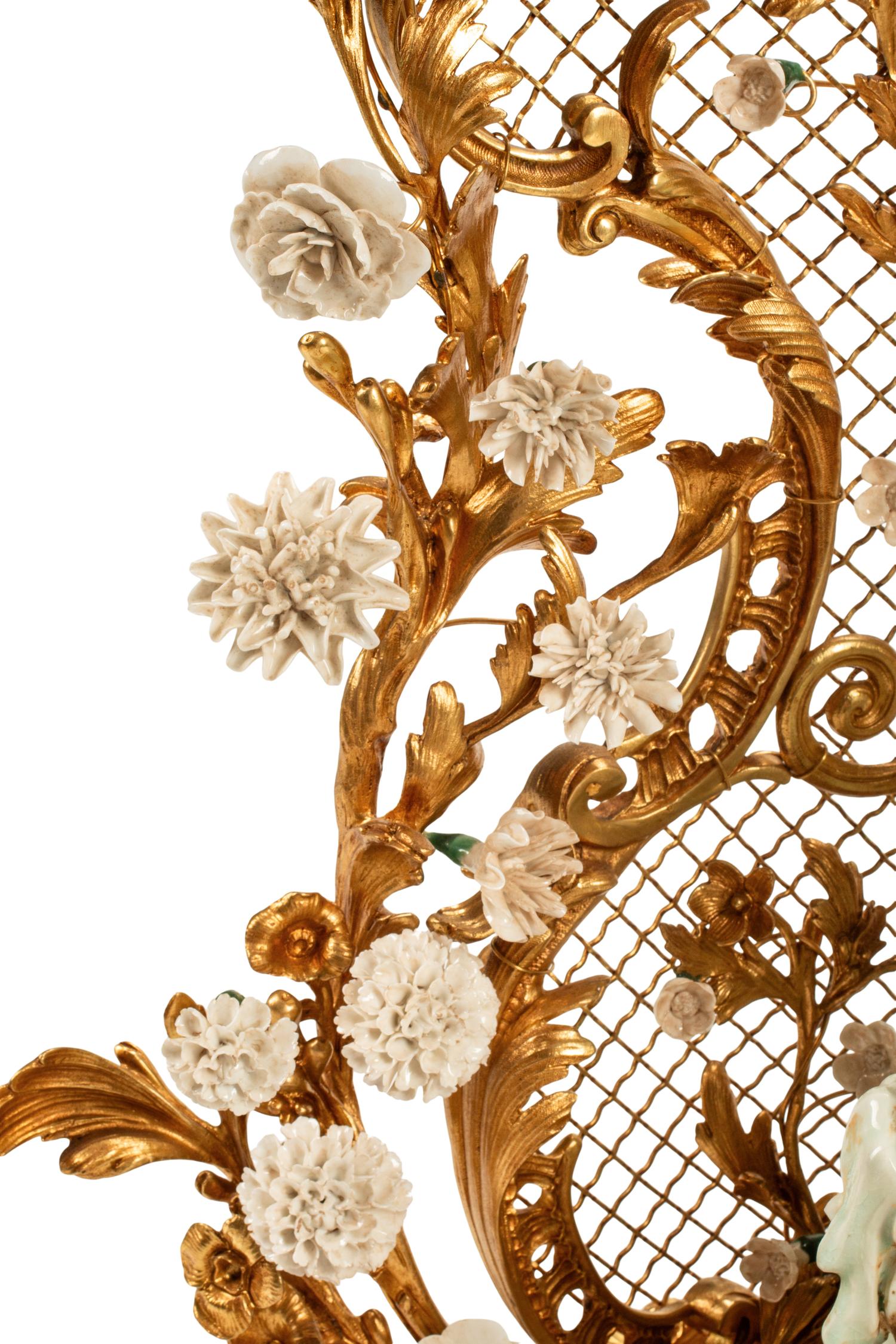 A Large Louis XV Style Gilt Bronze and White Porcelain Clock