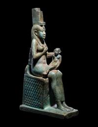 An Egyptian Faience Isis Nursing Harpocrates