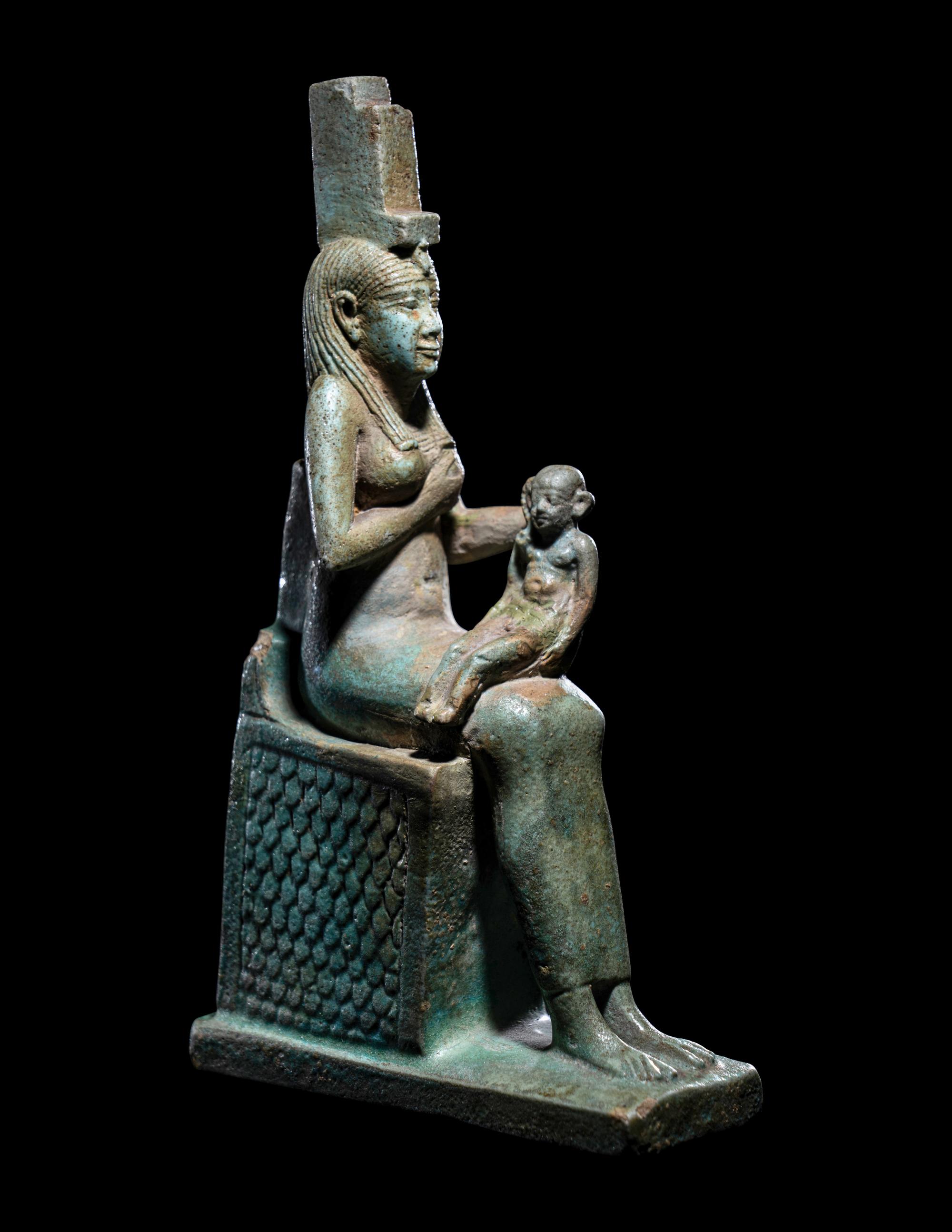 An Egyptian Faience Isis Nursing Harpocrates