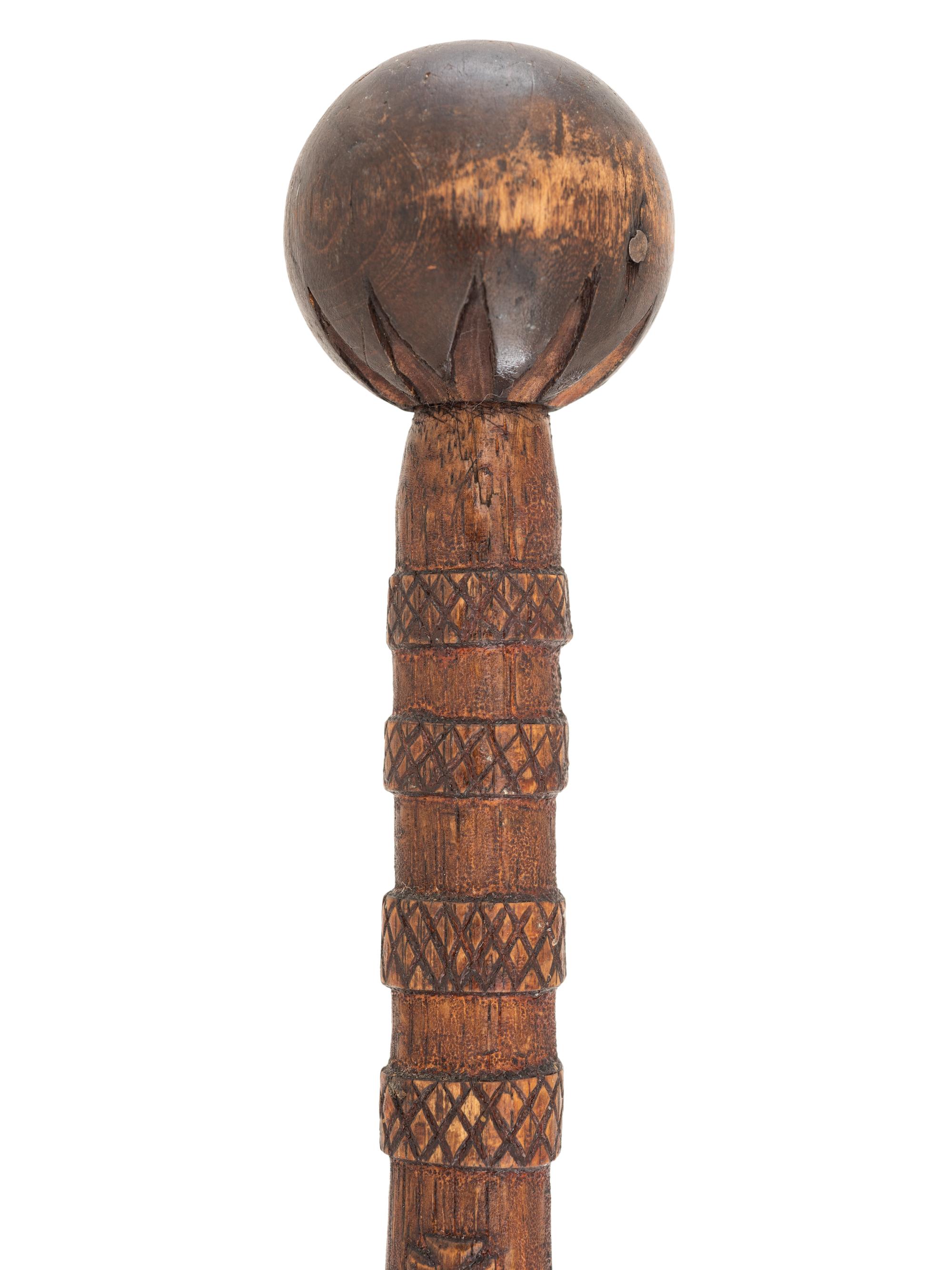 [CIVIL WAR]. GAR folk art carved cane featuring corps badges and patriotic motifs.