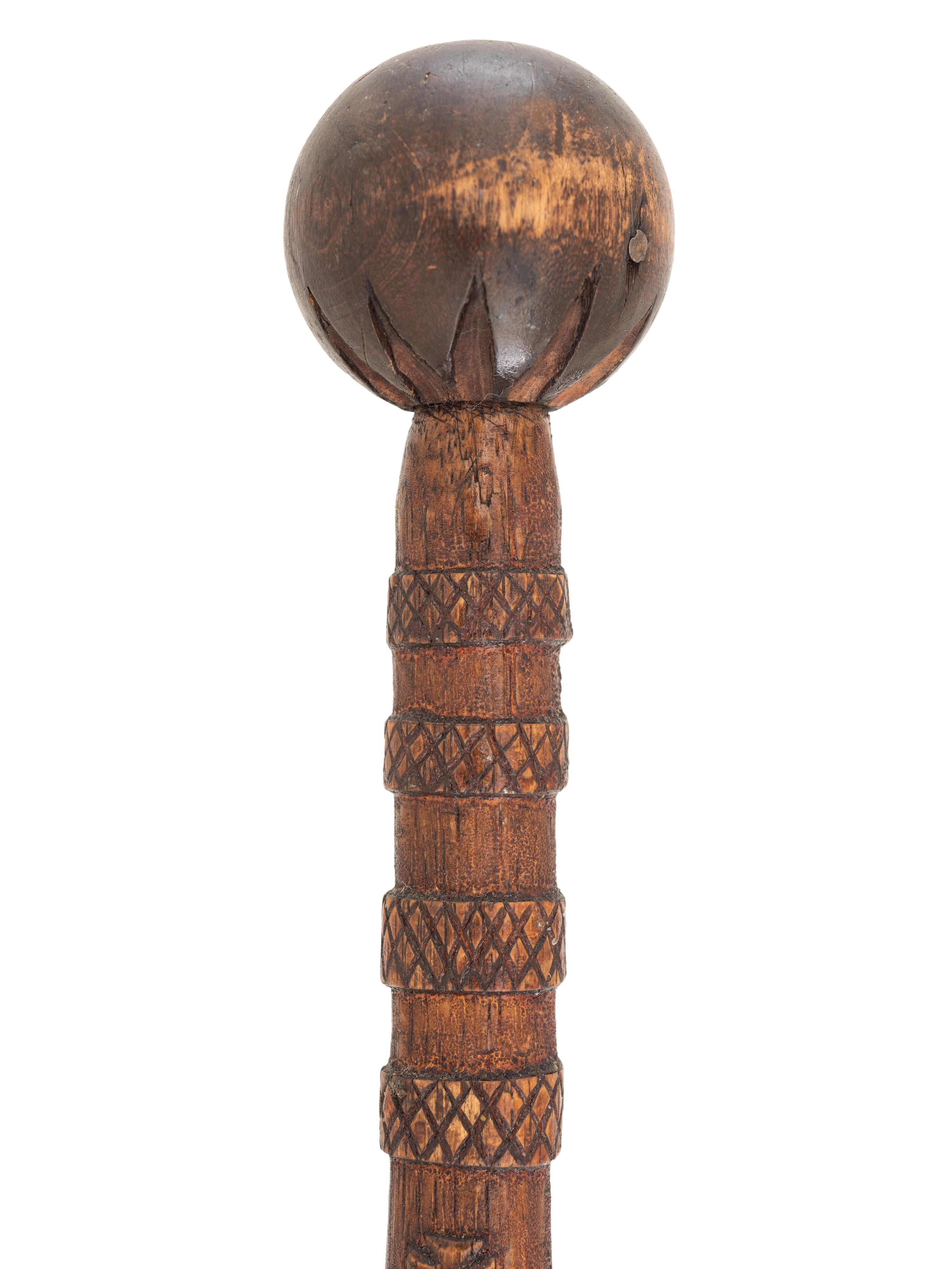 [CIVIL WAR]. GAR folk art carved cane featuring corps badges and patriotic motifs.