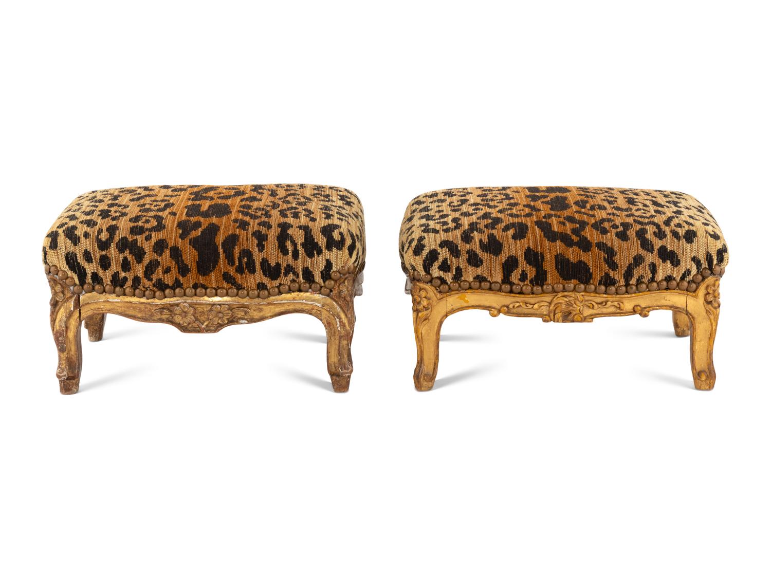 A Near Pair of Louis XV Giltwood Tabourets